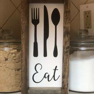 Wooden framed “Eat” sign